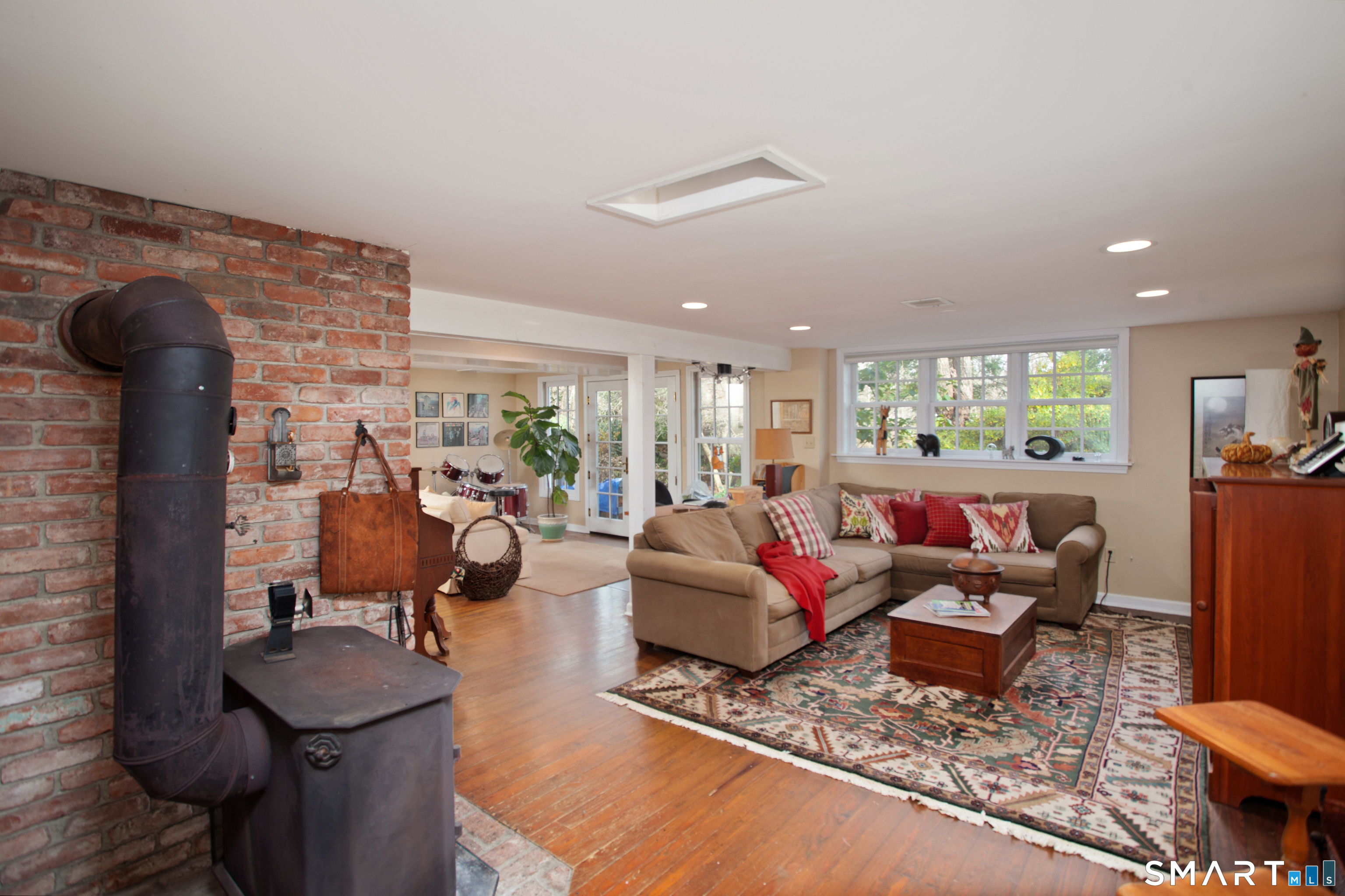 187 Wildcat Road Madison, CT 06443 - Photo 25 of 36 The lower level Family Room.
