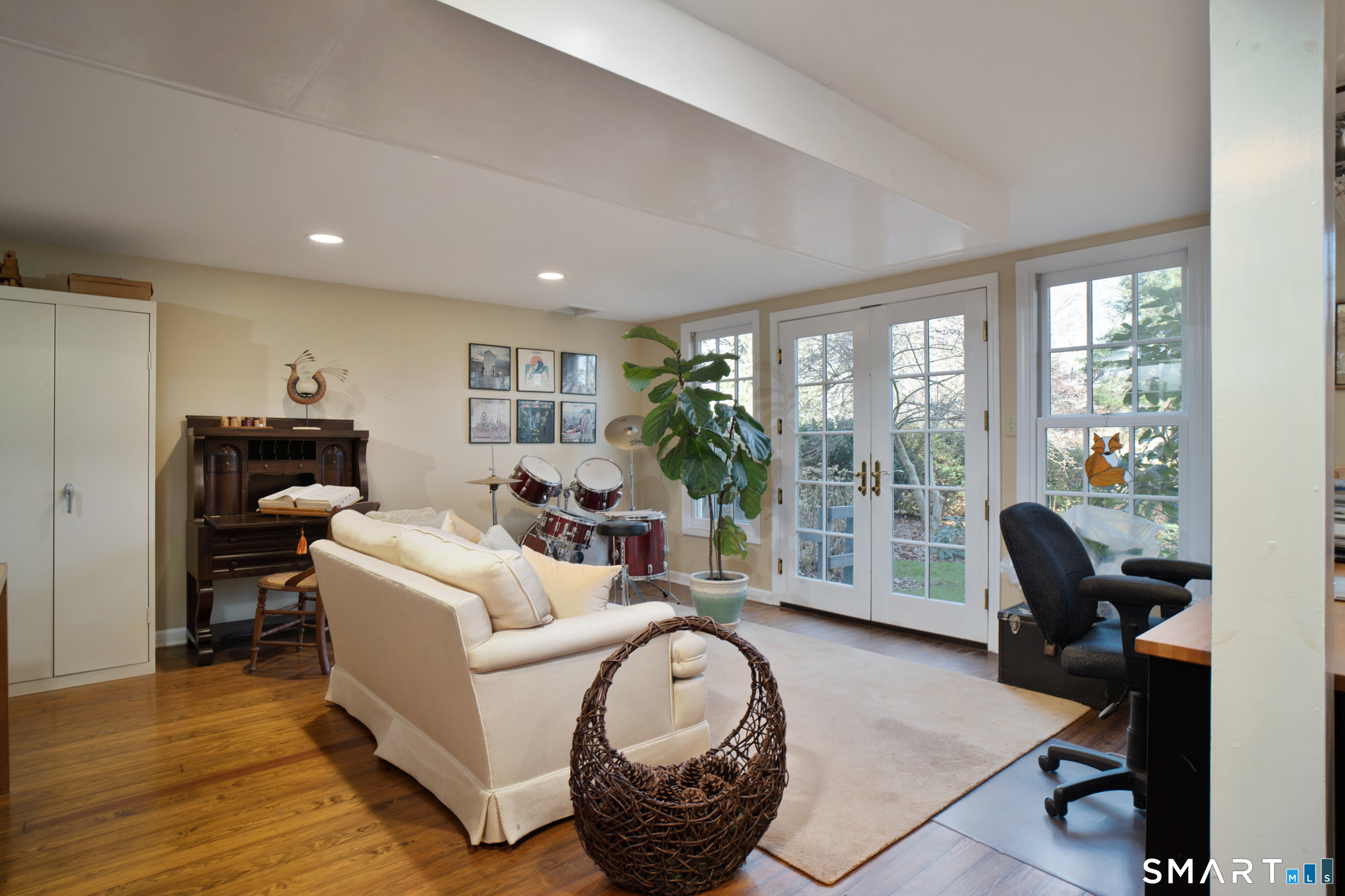 187 Wildcat Road Madison, CT 06443 - Photo 27 of 36 The walkout offers easy access to the outside and loads of natural light.