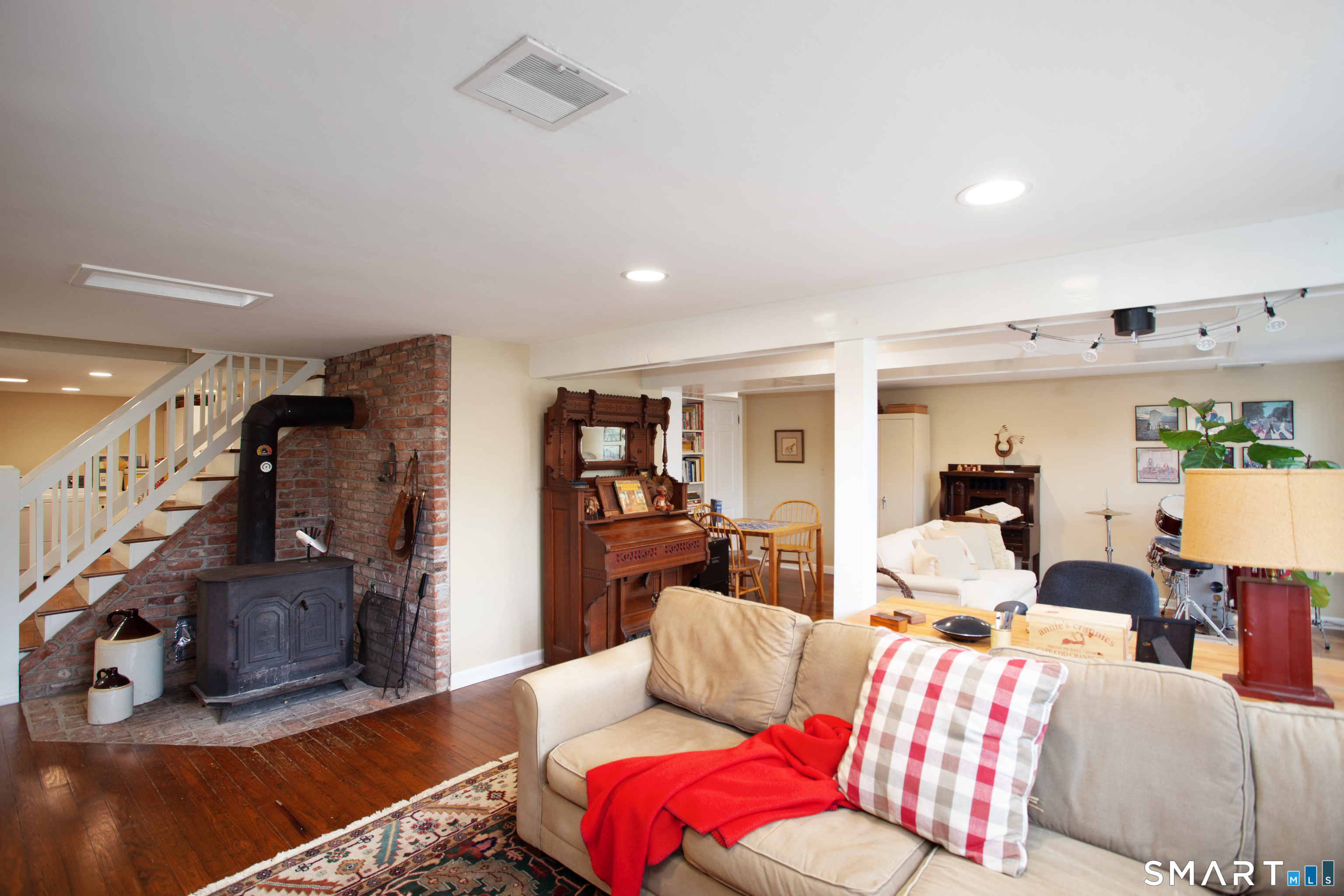 187 Wildcat Road Madison, CT 06443 - Photo 30 of 36 The wood burning stove is a great heating source!