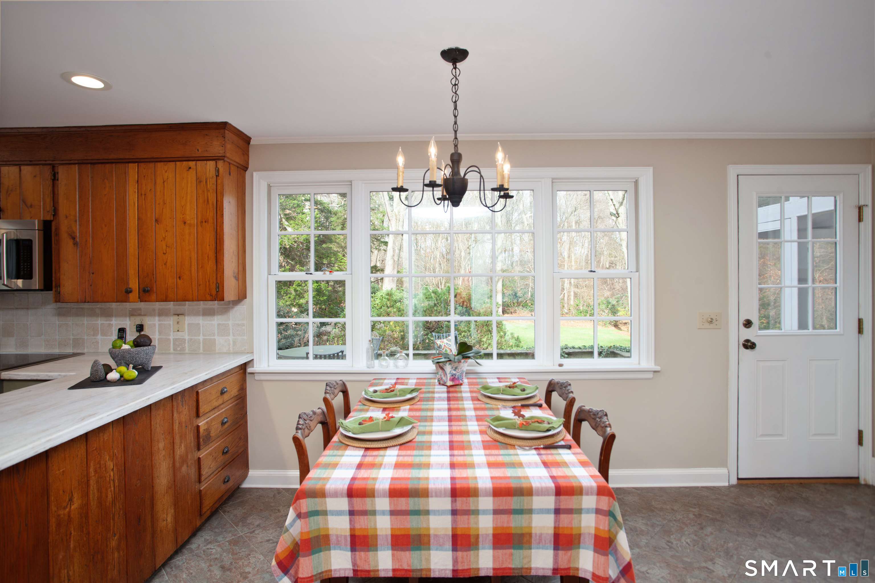 187 Wildcat Road Madison, CT 06443 - Photo 10 of 36 The Eat in Kitchen area. The door to the right lead to the back patio.