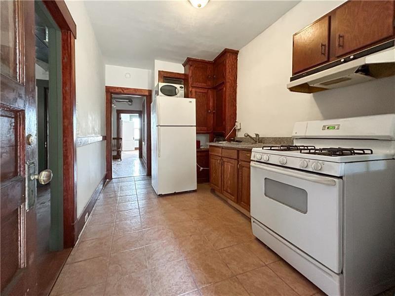 219 Brownsville Road Pittsburgh, PA 15210 - Photo 12 of 30 a utility room with washer and dryer