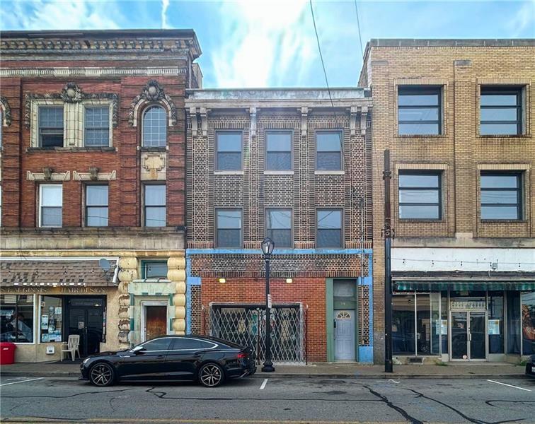 219 Brownsville Road Pittsburgh, PA 15210 - Photo 30 of 30 a building with a entrance