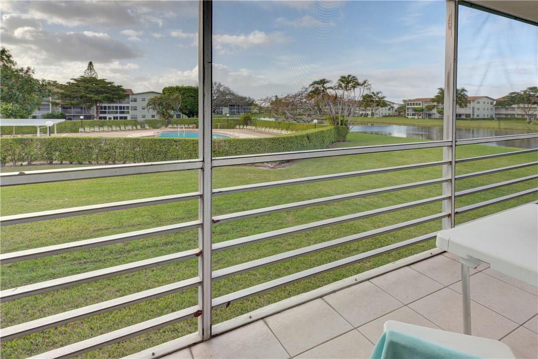 144 Dorset D, Unit 144 Boca Raton, FL 33434 - Photo 15 of 20 a view of a city from a terrace