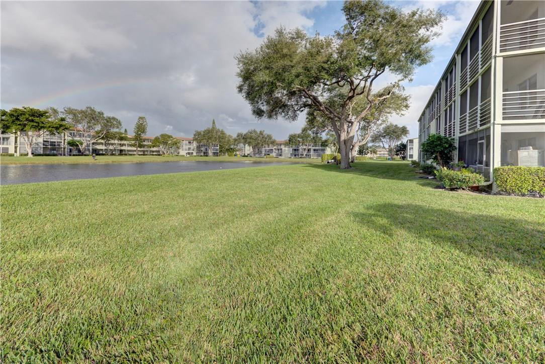 144 Dorset D, Unit 144 Boca Raton, FL 33434 - Photo 19 of 20 a view of outdoor space and yard