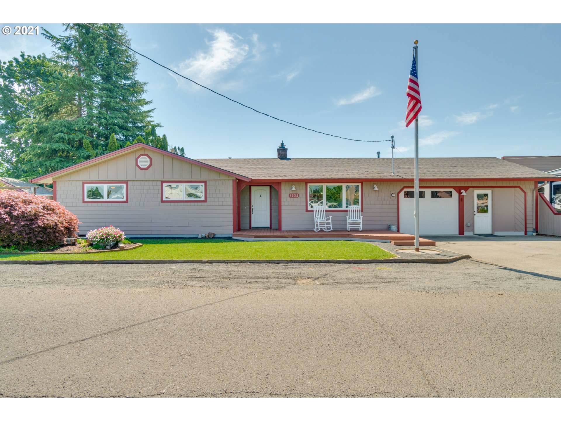 3132 1st Street Hubbard, OR 97032 - Photo 1 of 32 a aerial view of a house with a swimming pool