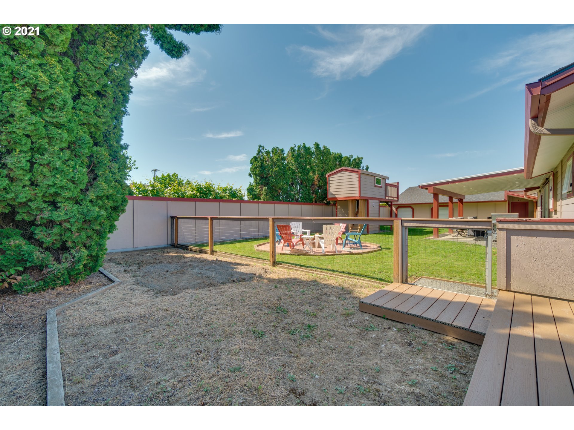 3132 1st Street Hubbard, OR 97032 - Photo 21 of 32 a view of outdoor space yard and swimming pool