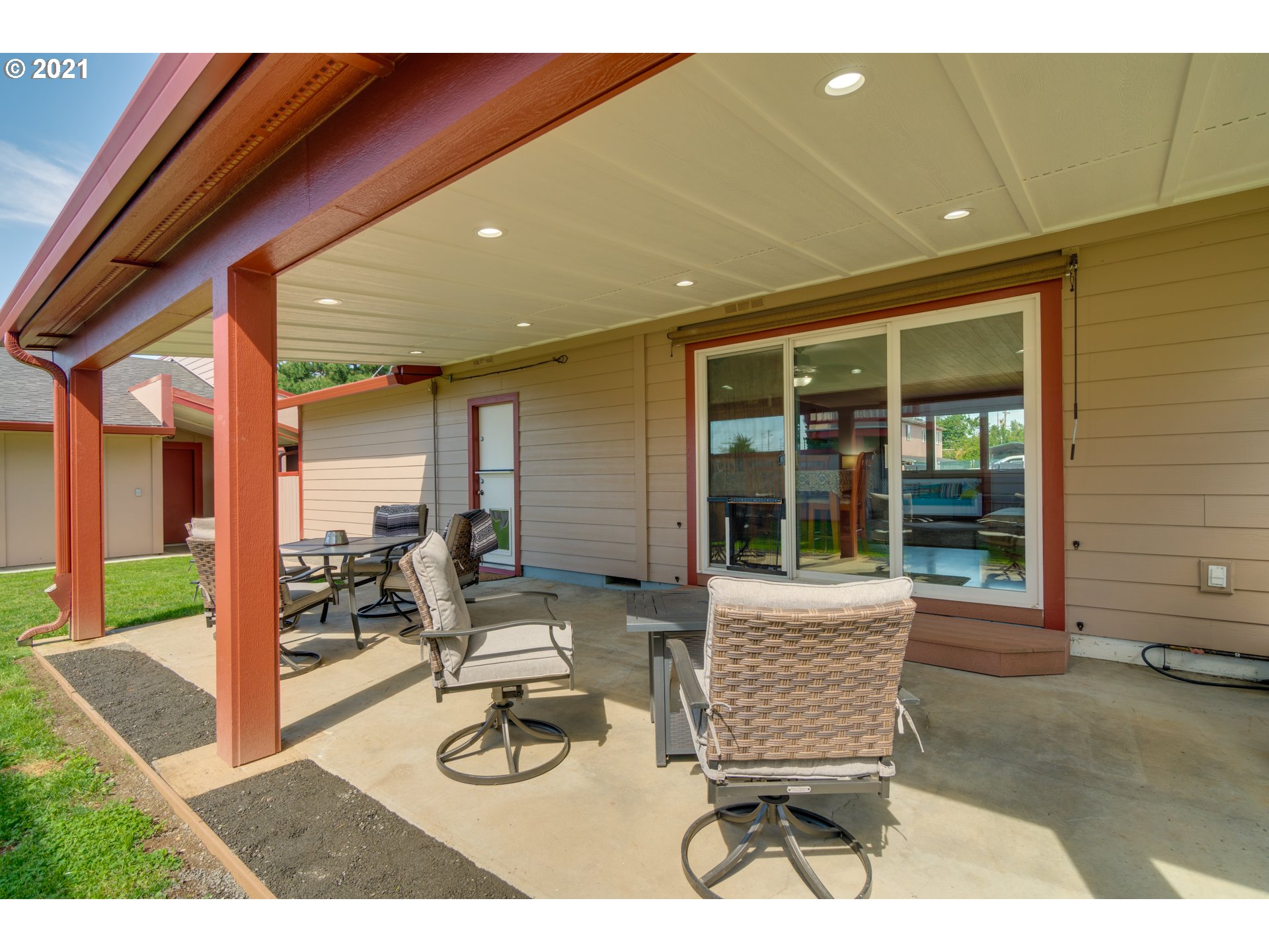 3132 1st Street Hubbard, OR 97032 - Photo 26 of 32 a front view of a house with outdoor seating