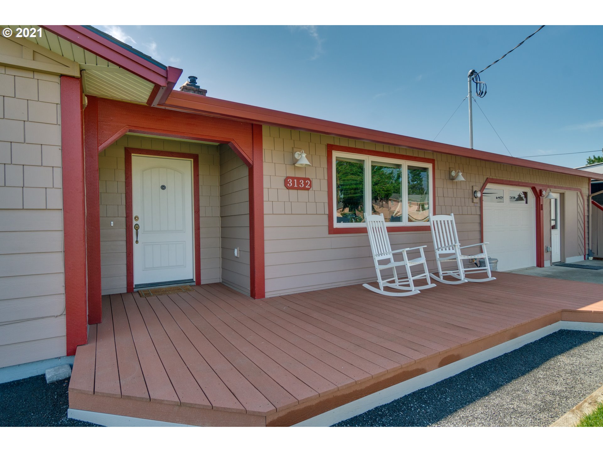 3132 1st Street Hubbard, OR 97032 - Photo 3 of 32 a view of a house with wooden deck and furniture
