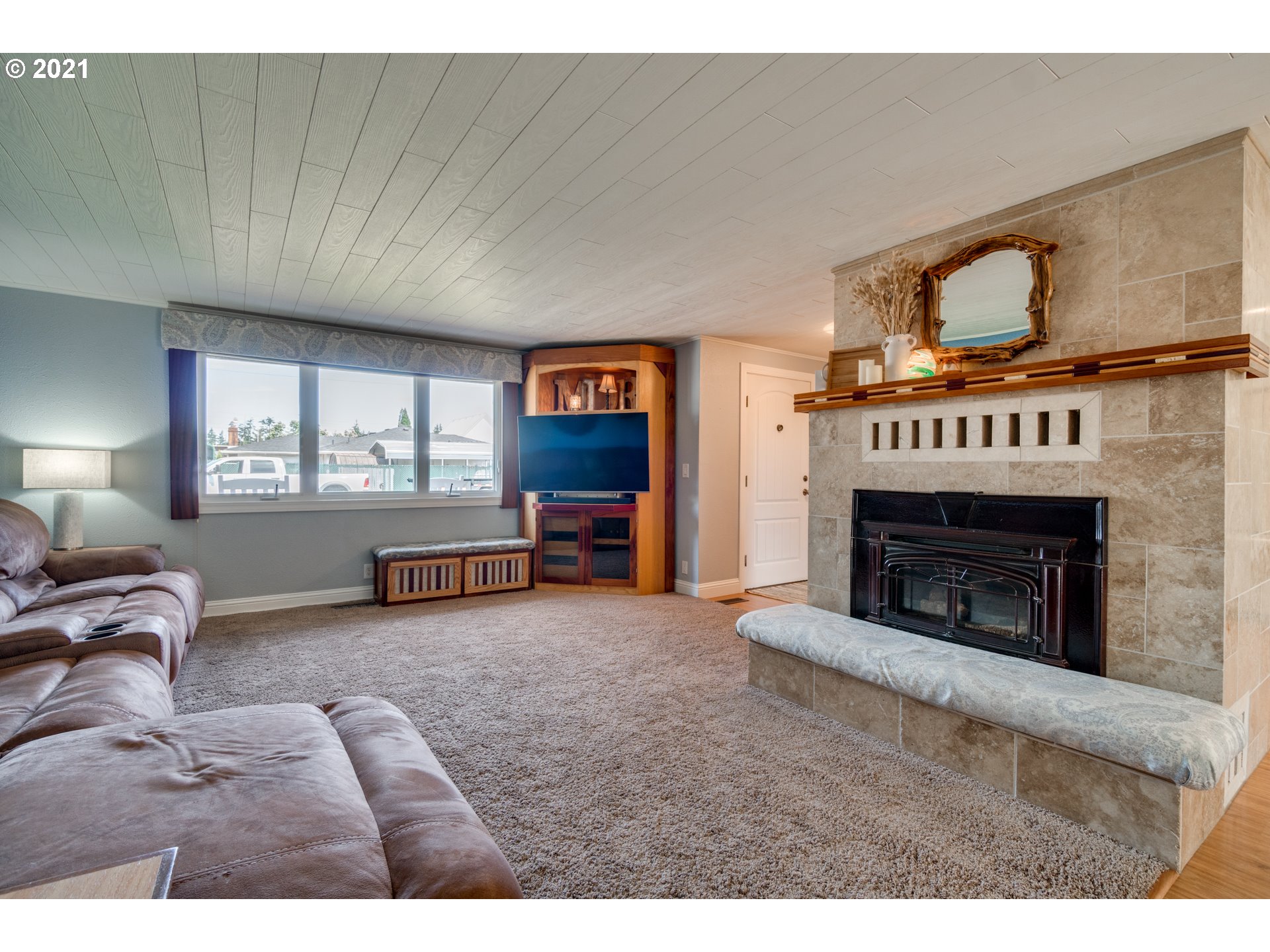 3132 1st Street Hubbard, OR 97032 - Photo 6 of 32 a living room with furniture and a fireplace