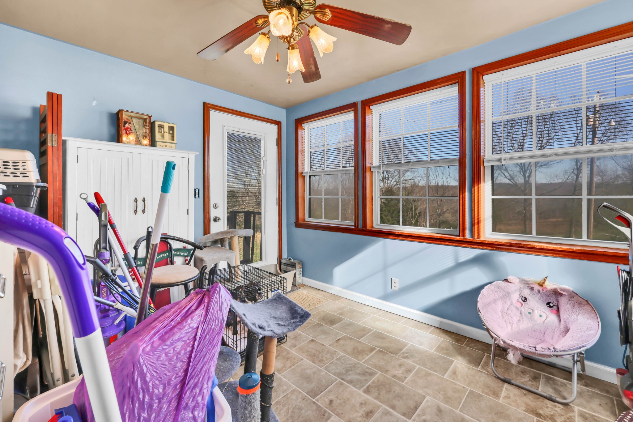 1765 Woolworth Road Erin, TN 37061 - Photo 18 of 34 a living room with furniture and a large window
