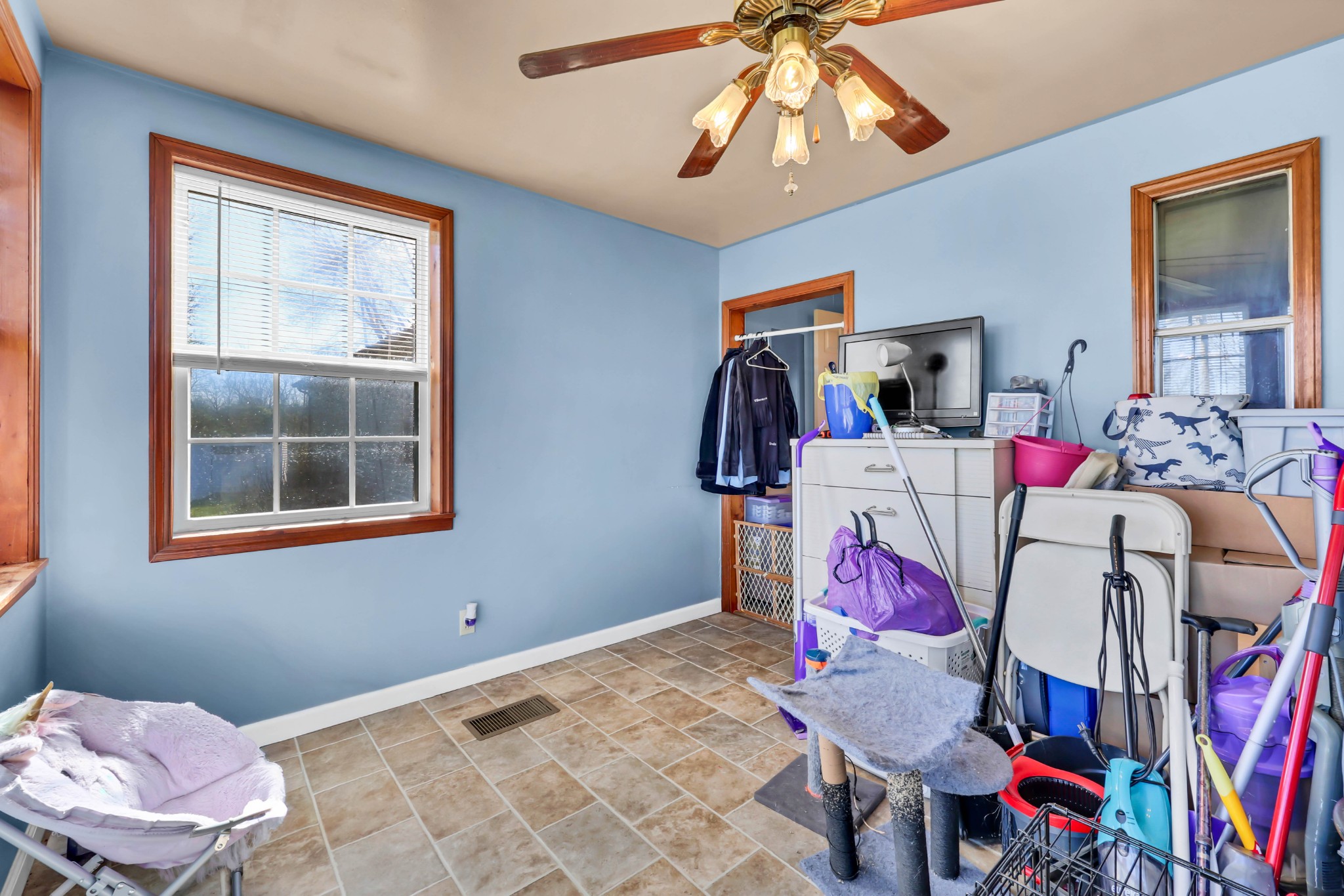 1765 Woolworth Road Erin, TN 37061 - Photo 19 of 34 a bedroom with furniture and a chandelier