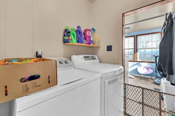a utility room with dryer and washer