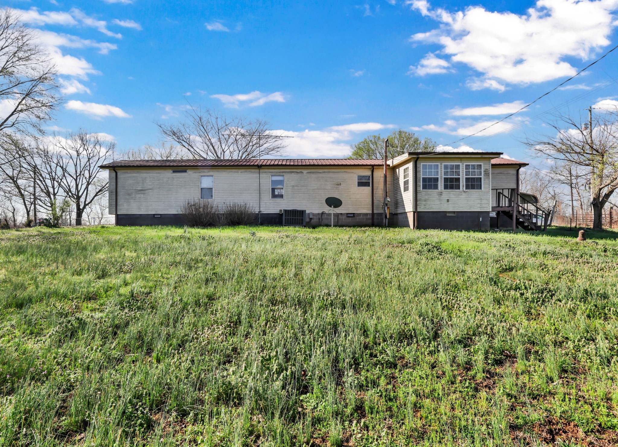1765 Woolworth Road Erin, TN 37061 - Photo 25 of 34 a house view with a garden space