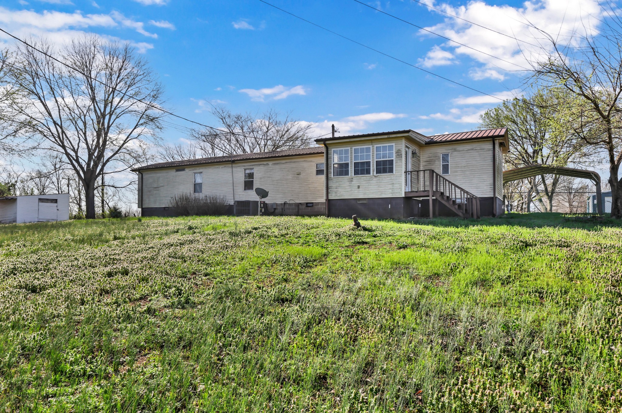 1765 Woolworth Road Erin, TN 37061 - Photo 27 of 34 a house view with a outdoor space