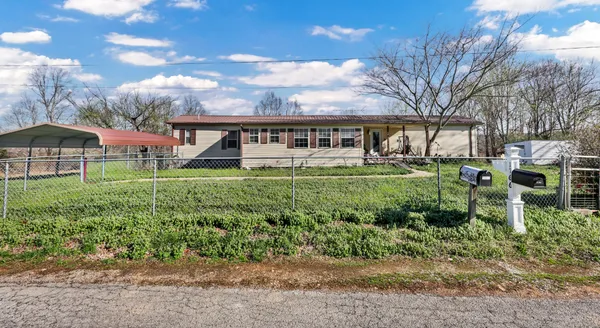 a house view with a garden space