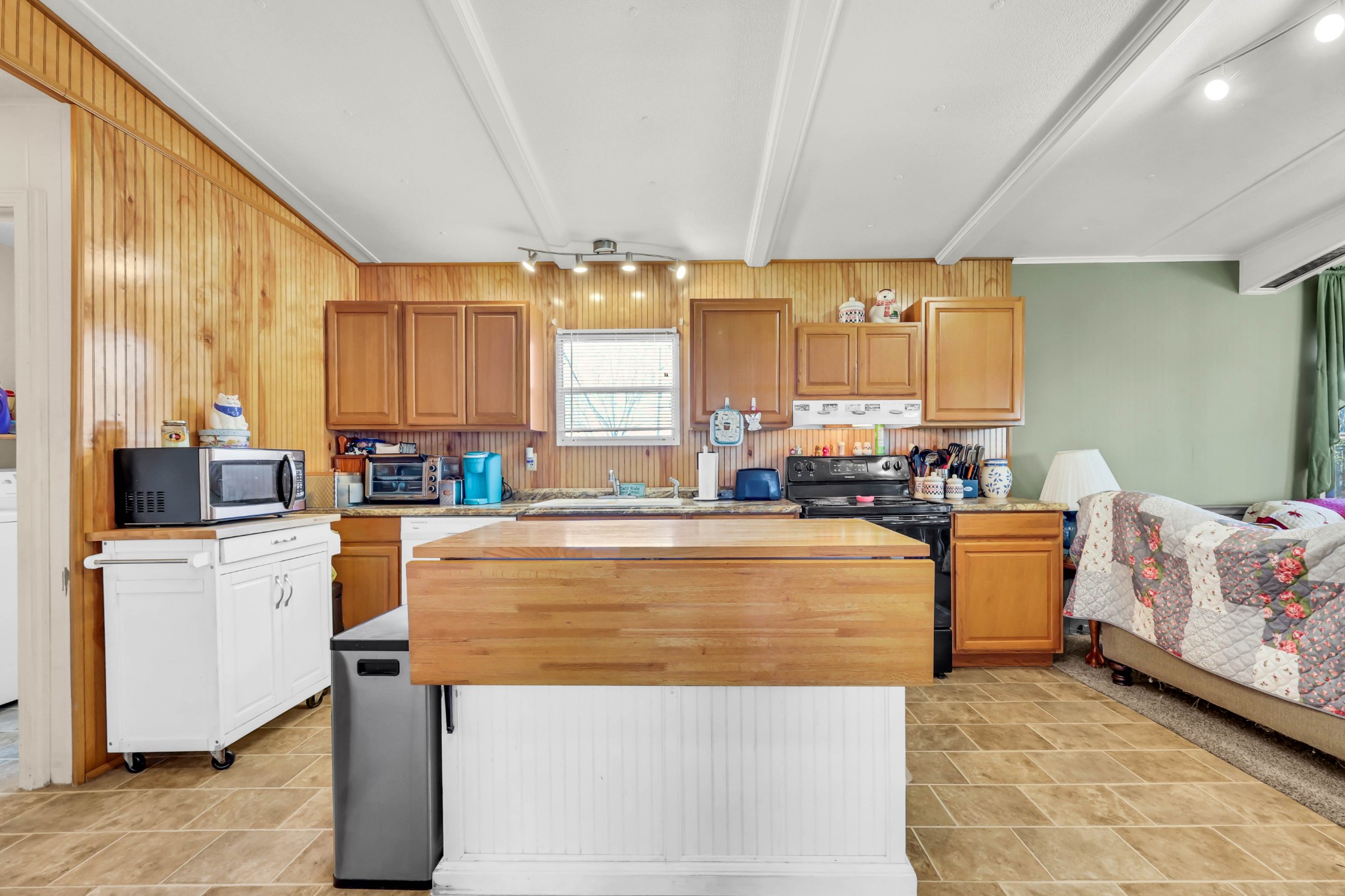1765 Woolworth Road Erin, TN 37061 - Photo 6 of 34 a living room with furniture and a large window