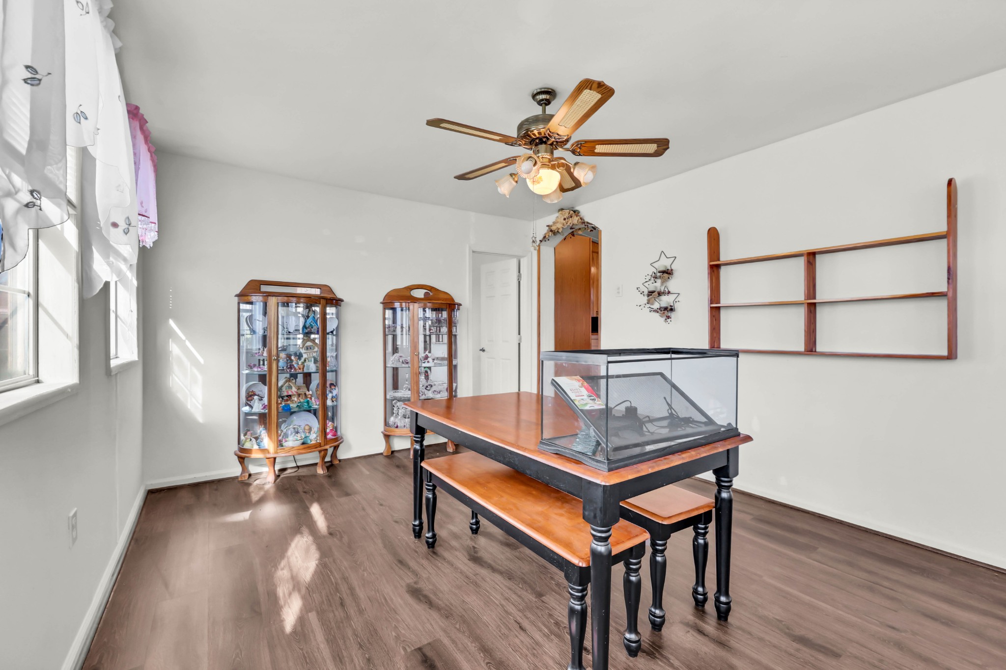 1765 Woolworth Road Erin, TN 37061 - Photo 9 of 34 a living room with pool table a window and a ceiling fan