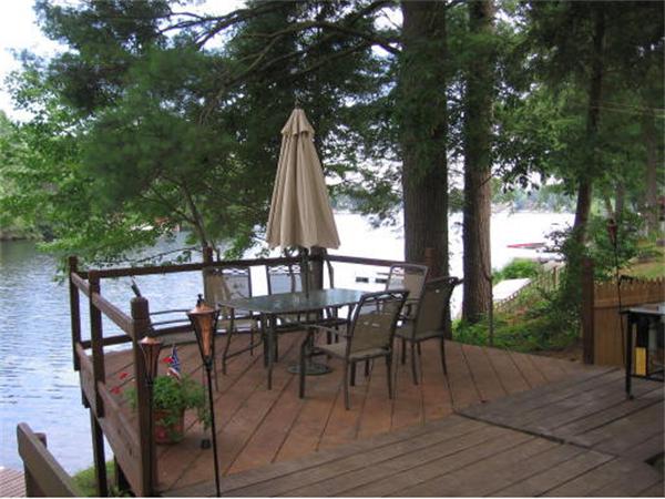 29 Union Point Road Webster, MA 01570 - Photo 3 of 30 a view of a chairs and table in patio