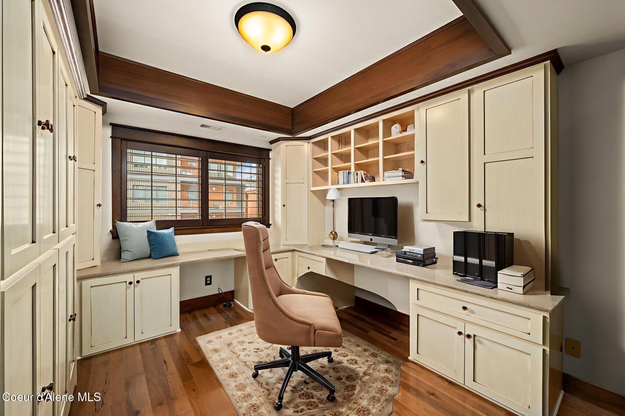 2050 North Main Street, Unit 202 Coeur D'Alene, ID 83814 - Photo 14 of 28 Custom cabinetry & Murphy bed