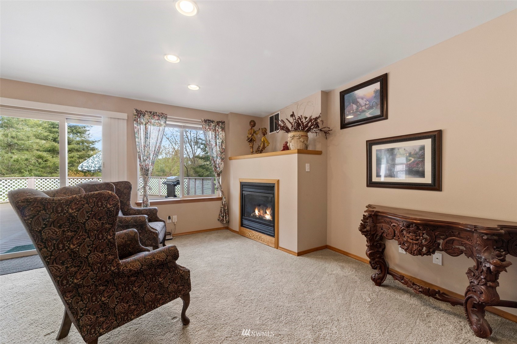 7511 Ham Road Ferndale, WA 98248 - Photo 15 of 40 a living room with furniture and a fireplace