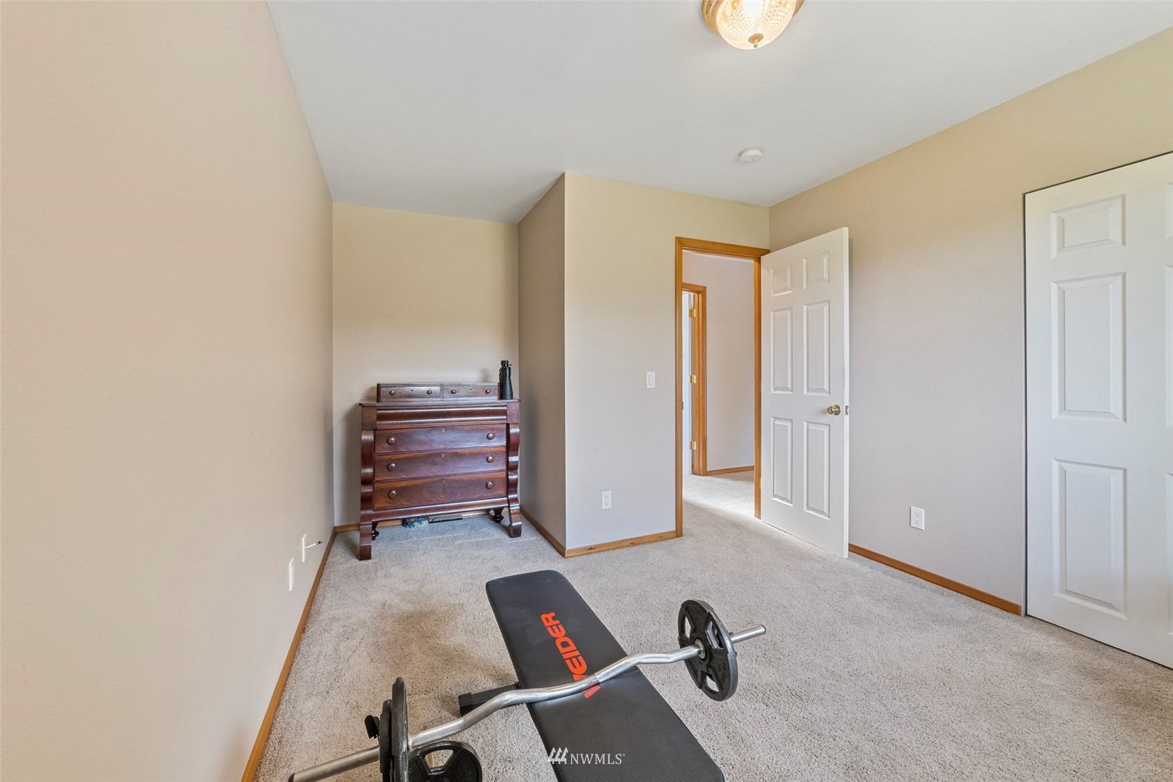 7511 Ham Road Ferndale, WA 98248 - Photo 21 of 40 a room with a window and gym equipment