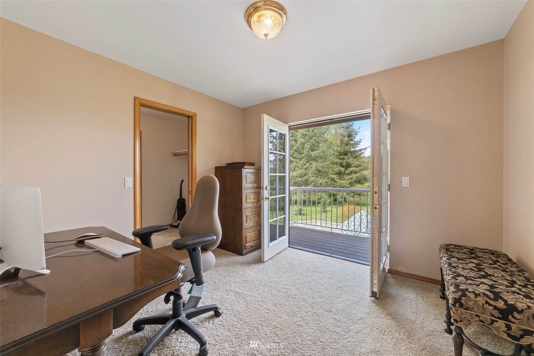 7511 Ham Road Ferndale, WA 98248 - Photo 22 of 40 a view of workspace with lounge chair and windows