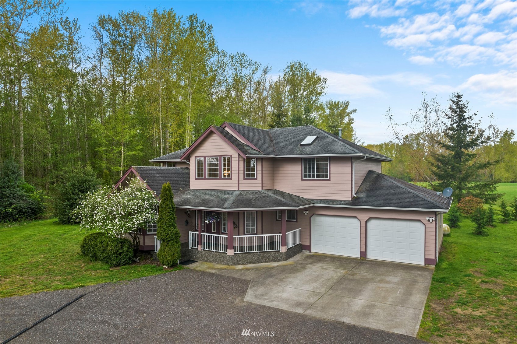 7511 Ham Road Ferndale, WA 98248 - Photo 3 of 40 a view of a house with a yard and large tree