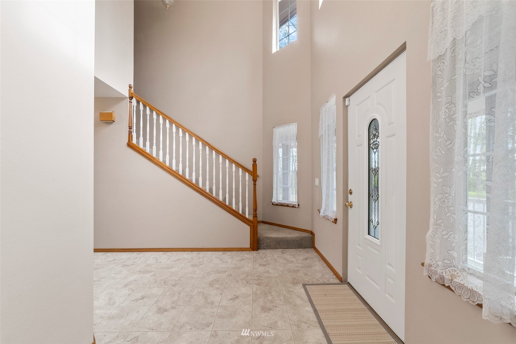 7511 Ham Road Ferndale, WA 98248 - Photo 7 of 40 a view of a hallway with windows
