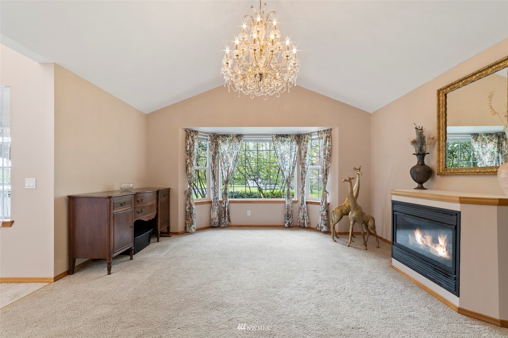 7511 Ham Road Ferndale, WA 98248 - Photo 8 of 40 a living room with furniture and a fireplace