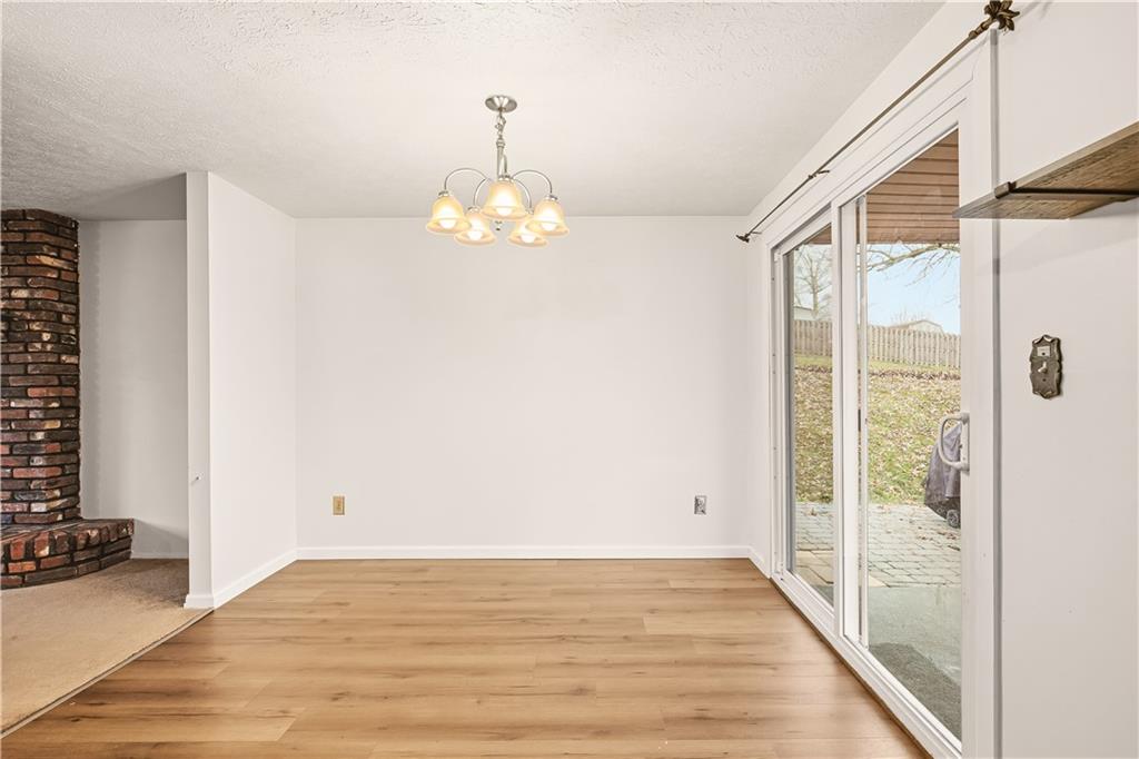 1425 Swede Hill Road Greensburg, PA 15601 - Photo 11 of 42 a view of empty room with wooden floor and fan