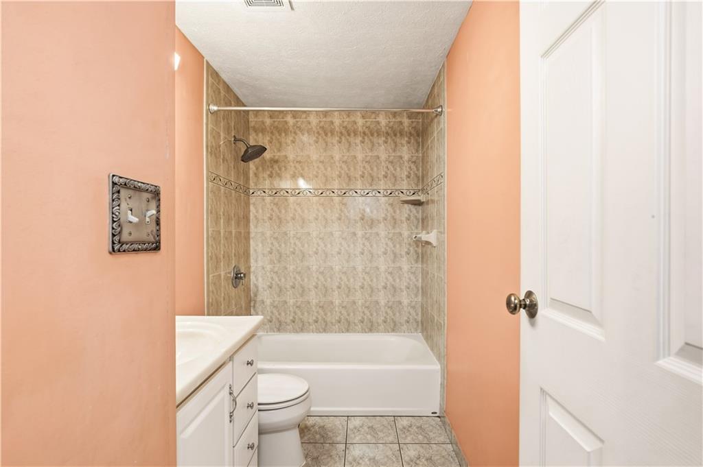 1425 Swede Hill Road Greensburg, PA 15601 - Photo 18 of 42 a bathroom with a shower a toilet and a sink