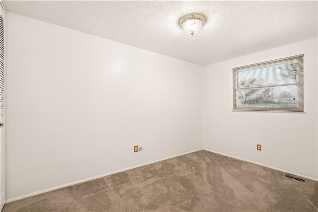 1425 Swede Hill Road Greensburg, PA 15601 - Photo 20 of 42 a view of a room with a fan