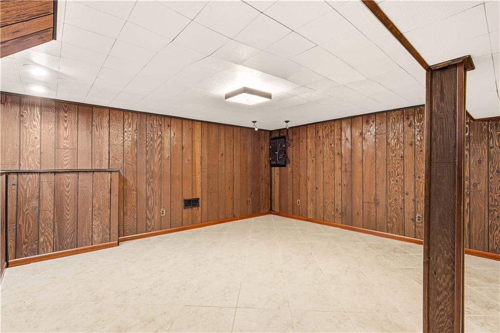 1425 Swede Hill Road Greensburg, PA 15601 - Photo 26 of 42 a view of a room with a wooden wall