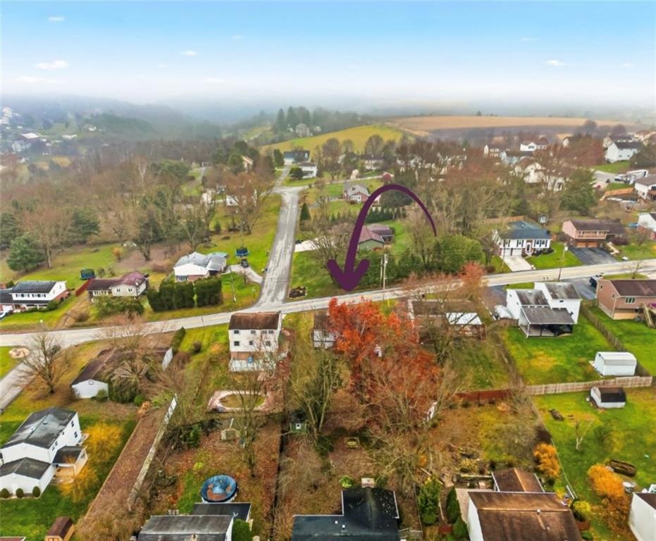 1425 Swede Hill Road Greensburg, PA 15601 - Photo 41 of 42 an aerial view of residential building with an outdoor space and seating