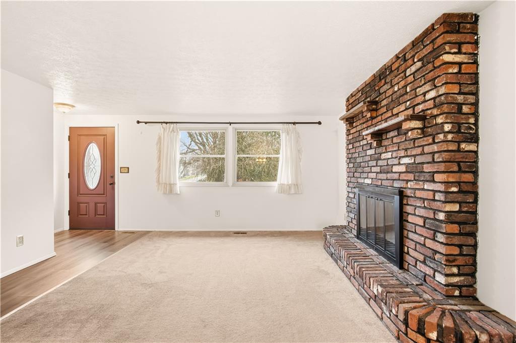 1425 Swede Hill Road Greensburg, PA 15601 - Photo 8 of 42 an empty room with windows