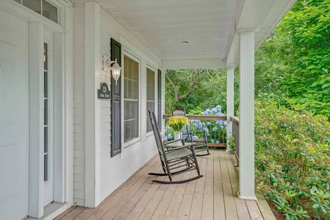 a view of a chairs in a balcony
