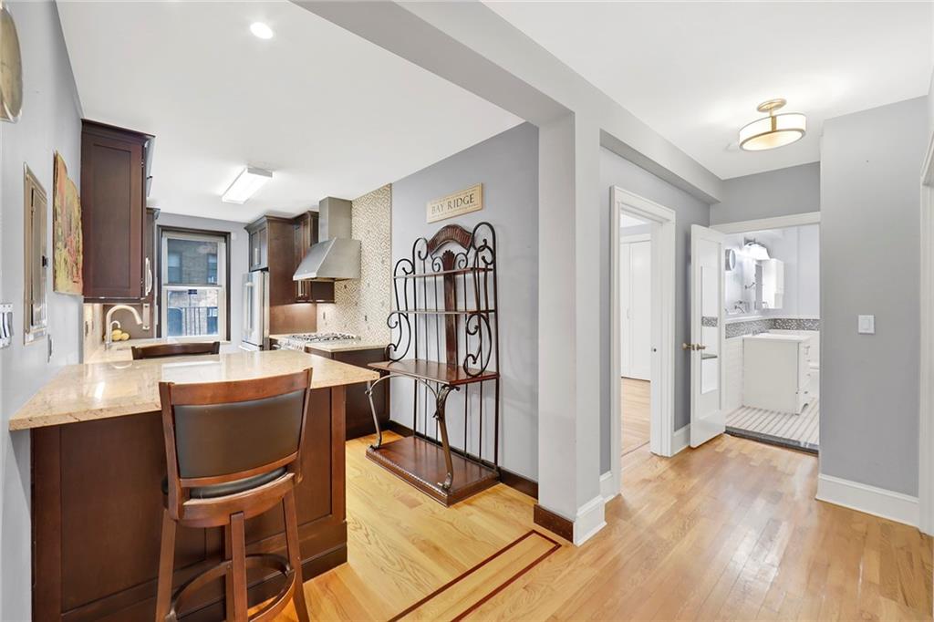9615 Shore Road, Unit 3A Brooklyn, NY 11209 - Photo 7 of 14 a view of a kitchen and dining room