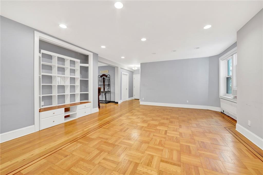 9615 Shore Road, Unit 3A Brooklyn, NY 11209 - Photo 8 of 14 a view of an empty room with a window and kitchen view
