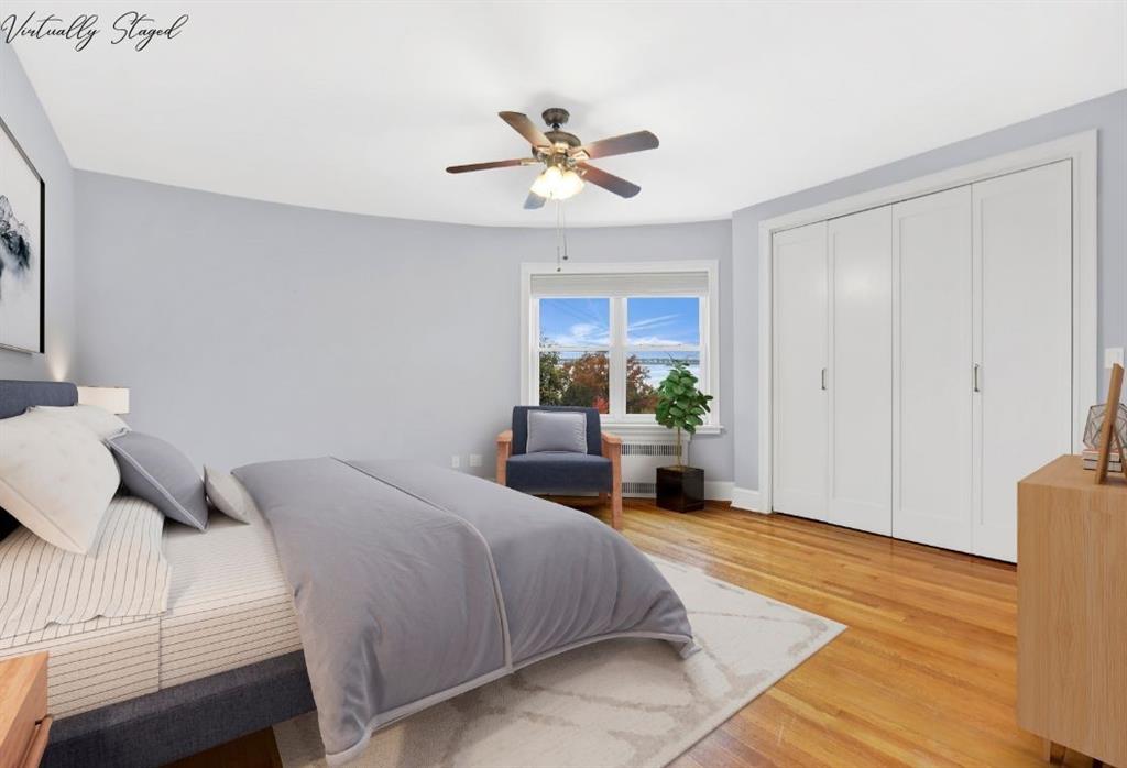 9615 Shore Road, Unit 3A Brooklyn, NY 11209 - Photo 10 of 14 a bedroom with a bed and a chandelier