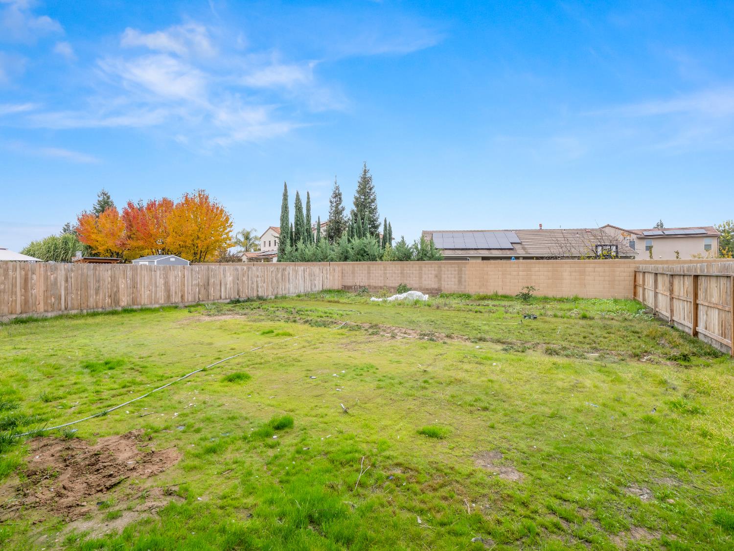 5958 West Austin Way Fresno, CA 93722 - Photo 4 of 18 a view of outdoor space and yard