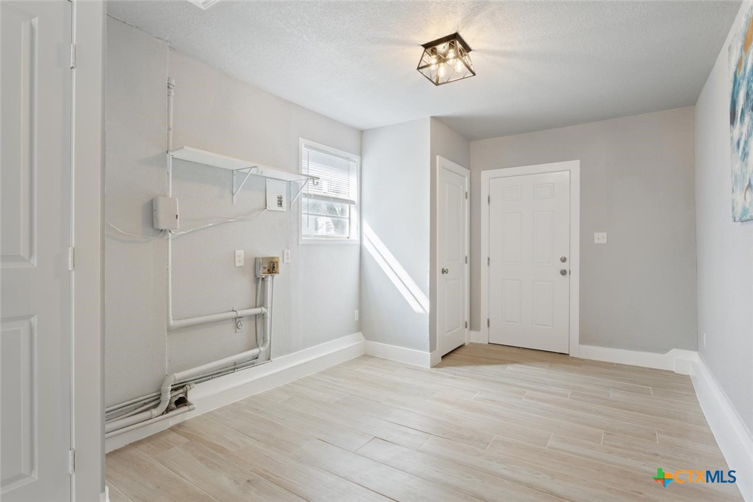 811 North 6th Street Temple, TX 76501 - Photo 19 of 23 wooden floor in an empty room