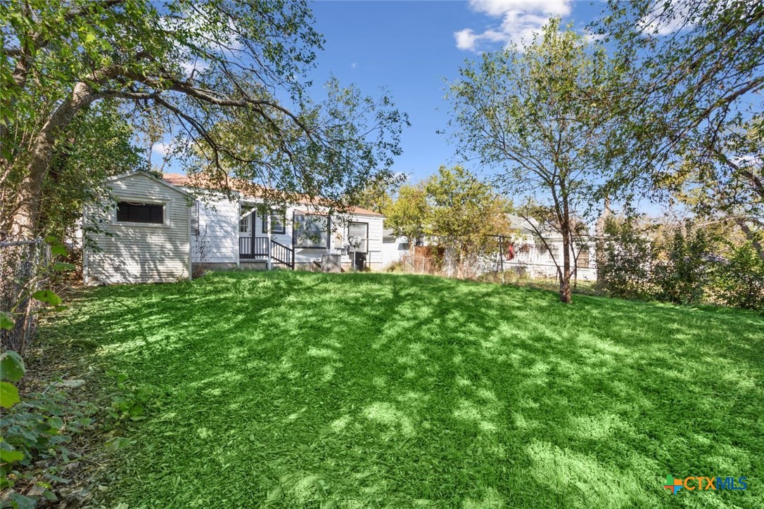 811 North 6th Street Temple, TX 76501 - Photo 20 of 23 a view of a house with a yard porch and sitting area