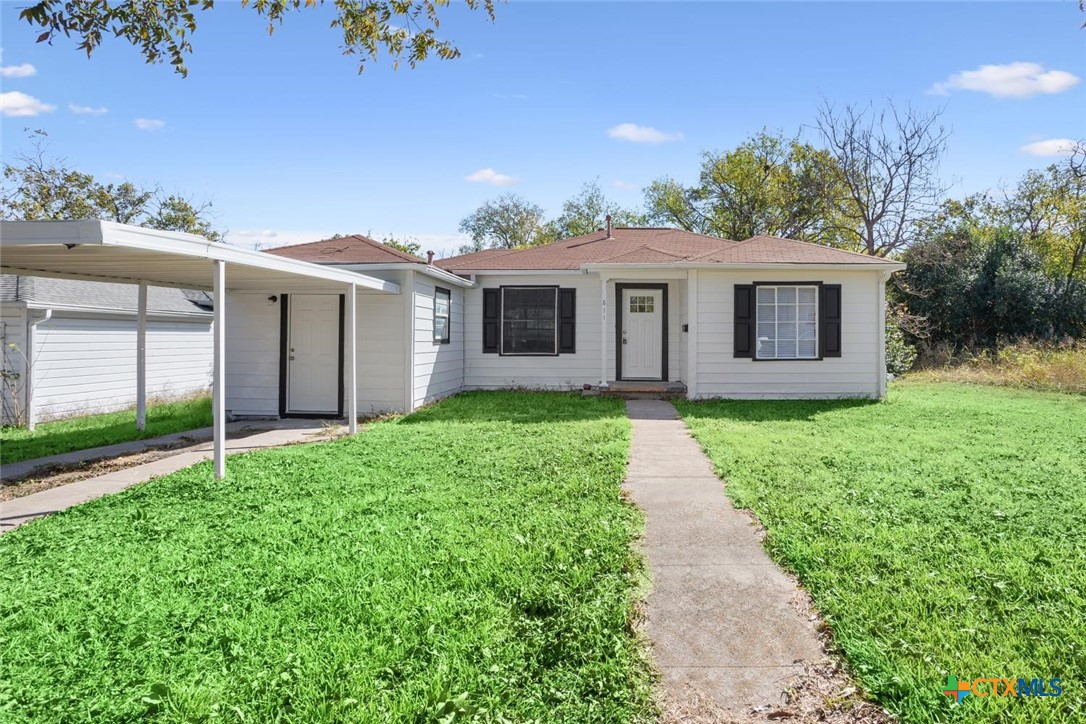 811 North 6th Street Temple, TX 76501 - Photo 23 of 23 a view of a house with yard and a garden