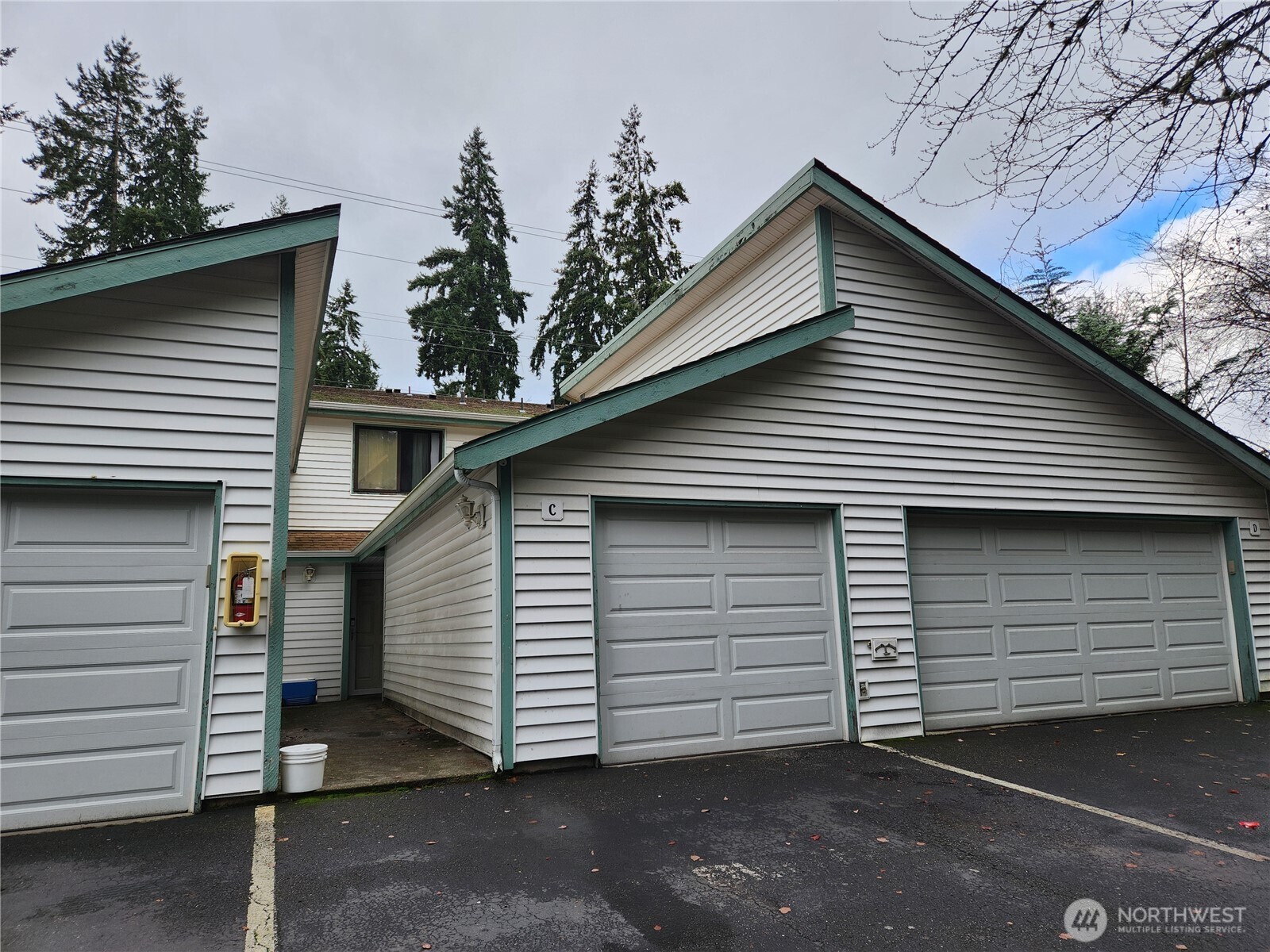 2019 Southwest 318th Place, Unit 4C Federal Way, WA 98023 - Photo 1 of 23 a view of a house with a garage