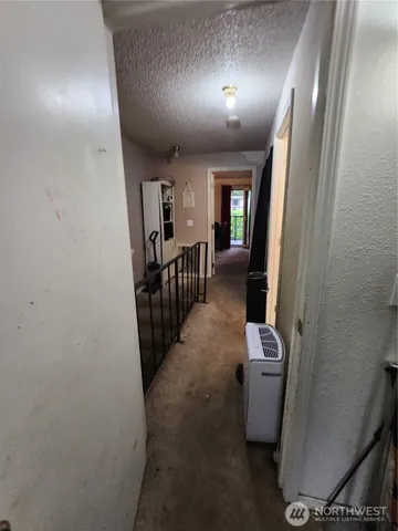a bathroom with a sink a toilet and shower curtain