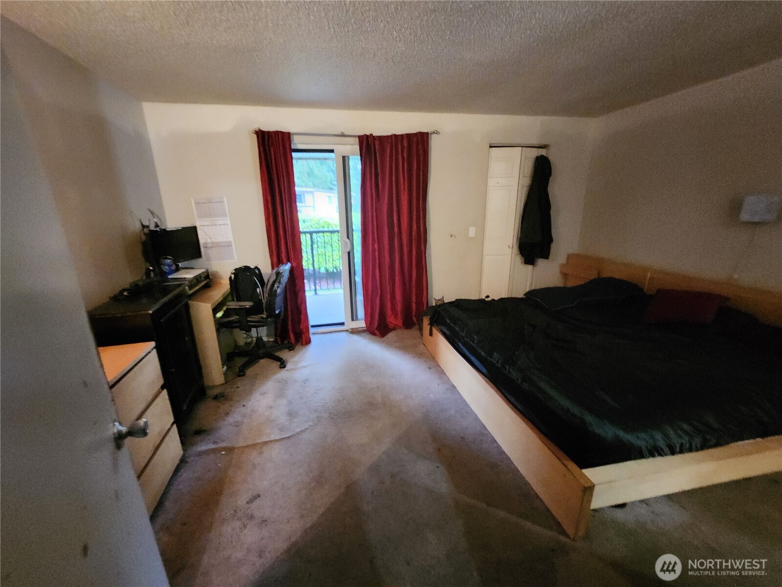 2019 Southwest 318th Place, Unit 4C Federal Way, WA 98023 - Photo 16 of 23 a bedroom with a bed and a window