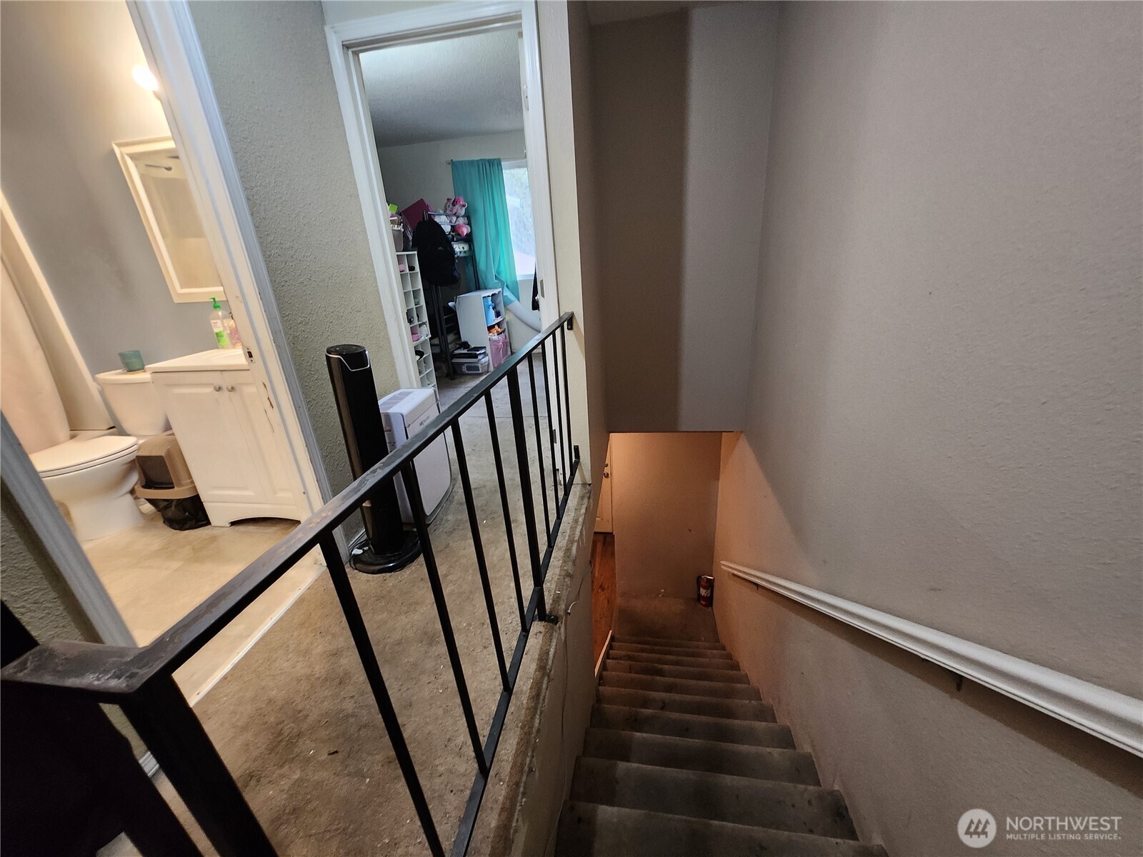2019 Southwest 318th Place, Unit 4C Federal Way, WA 98023 - Photo 20 of 23 a view of a hallway with wooden floor and stairs