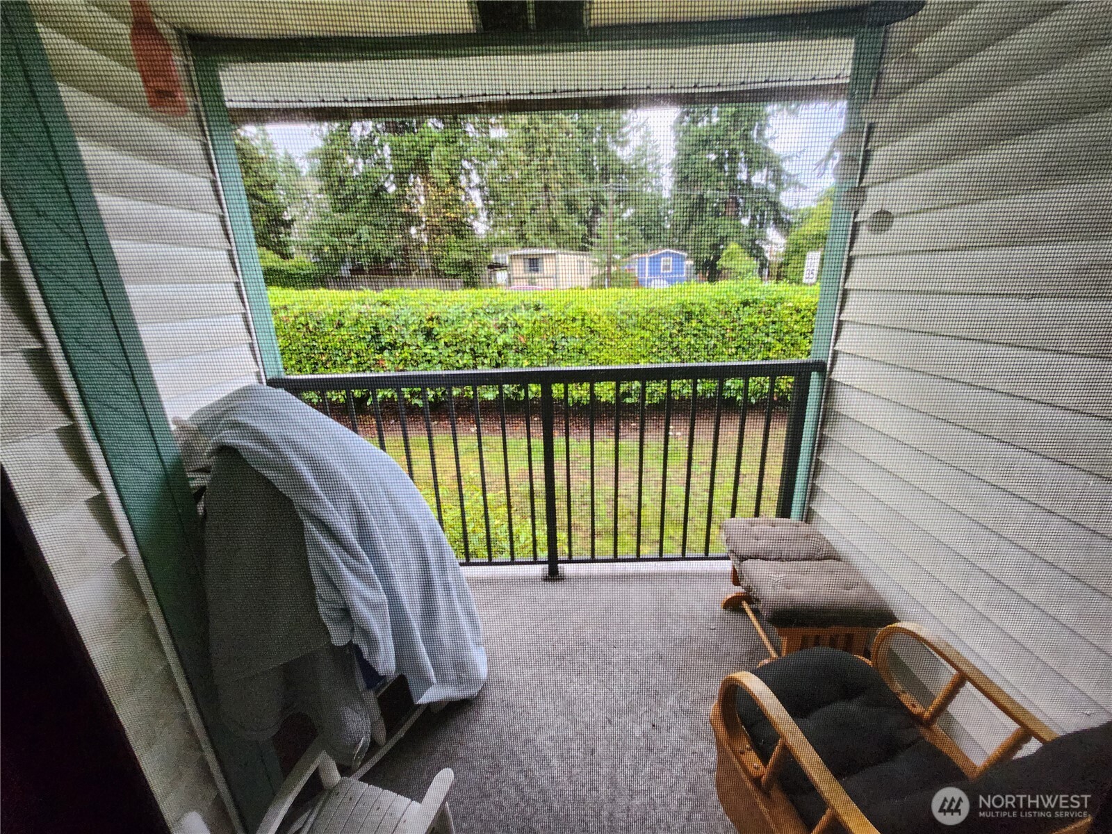 2019 Southwest 318th Place, Unit 4C Federal Way, WA 98023 - Photo 8 of 23 a view of a balcony with chairs