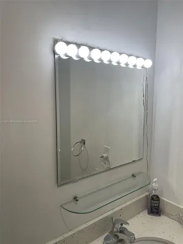 a bathroom with a glass shower