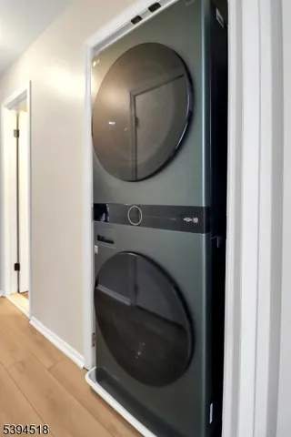 a bathroom with a mirror and vanity